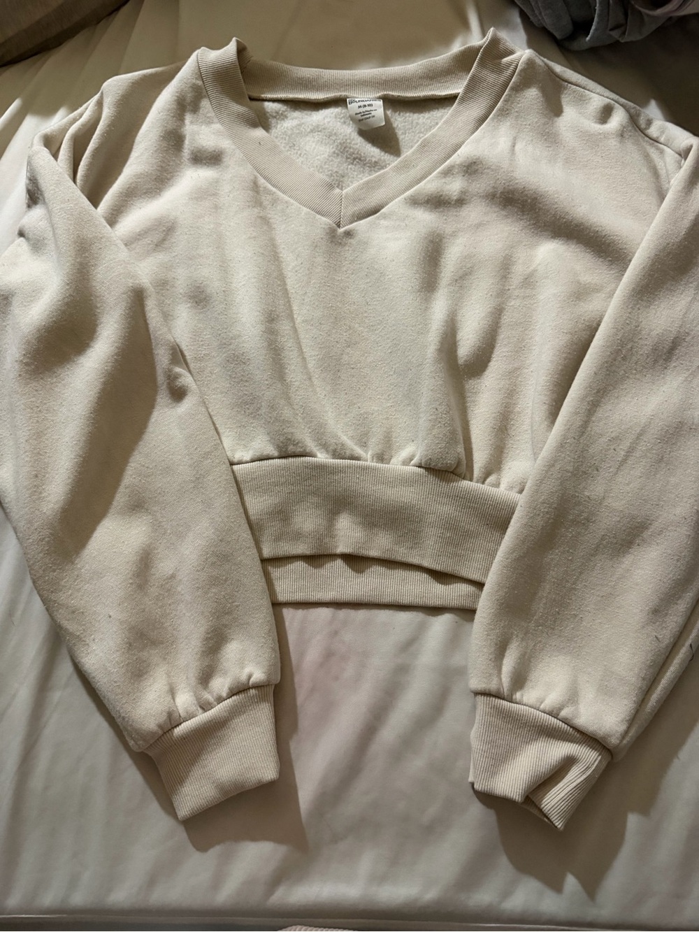 No Boundaries Cream V-Neck Cropped Sweatshirt Top